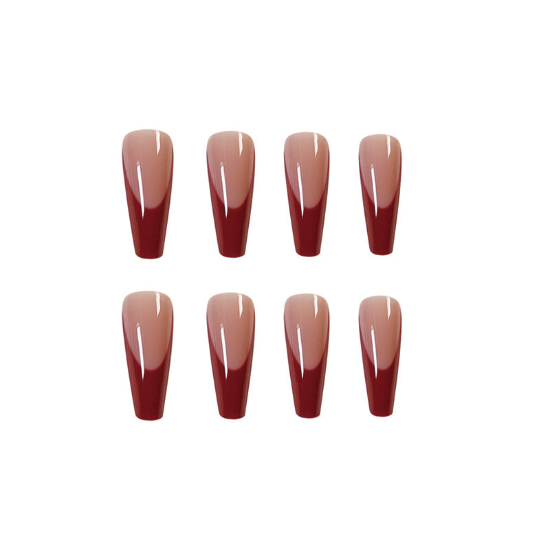 Elegant artificial nails with high-gloss finish and prominent French tip Bowlift