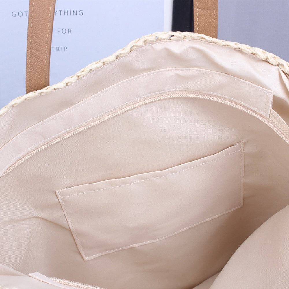 Handwoven beach bag made of natural materials with leather accents Bowlift