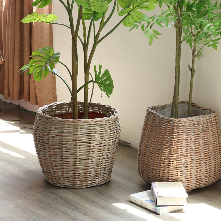Stylish laundry basket made of braided natural material Bowlift