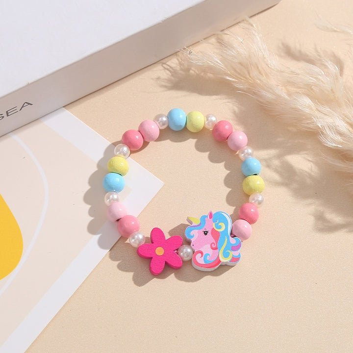 Playful children's bracelet with unicorn and flower motif Bowlift