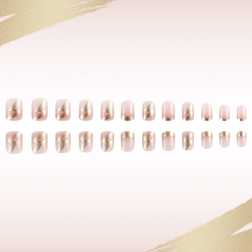 Elegant French Tip Press-On Nails with Gold Accents Bowlift