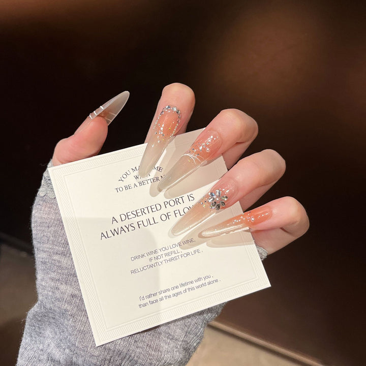 Elegant Stiletto Press-On Nail Extensions with Rhinestones Bowlift