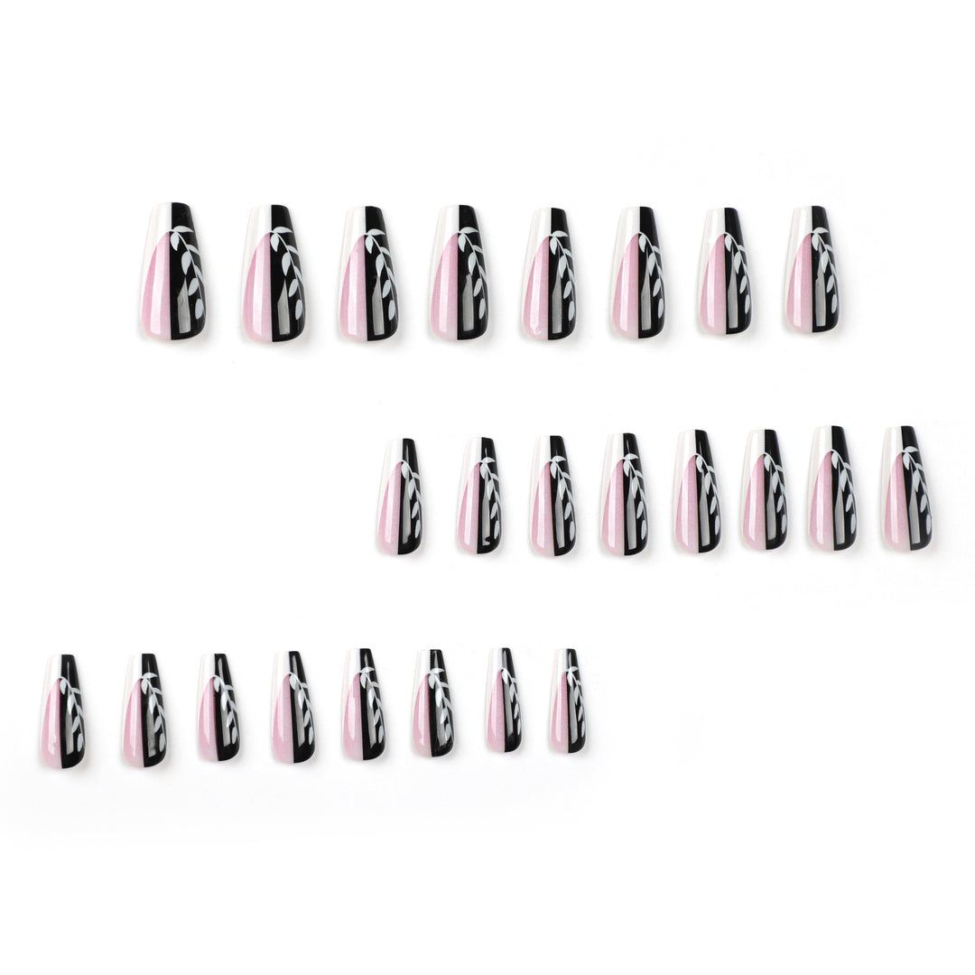 Artful nail extensions in elegant black and white design Bowlift