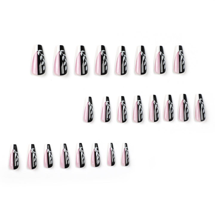 Artful nail extensions in elegant black and white design Bowlift