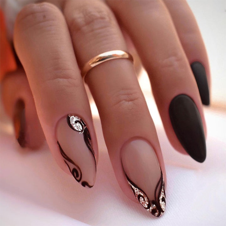 Creative nail art set with exquisite marbled designs and elegant accents Bowlift