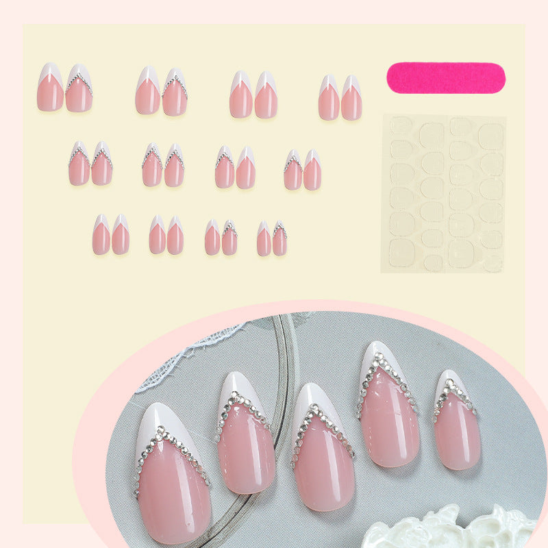 Elegant Pointed Press-On Nails with Rhinestone Accents Bowlift