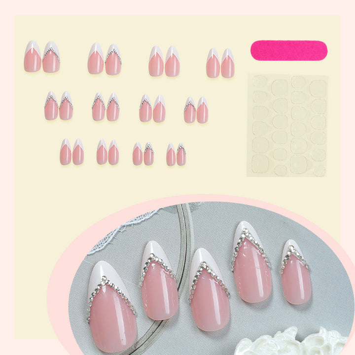 Elegant Pointed Press-On Nails with Rhinestone Accents Bowlift
