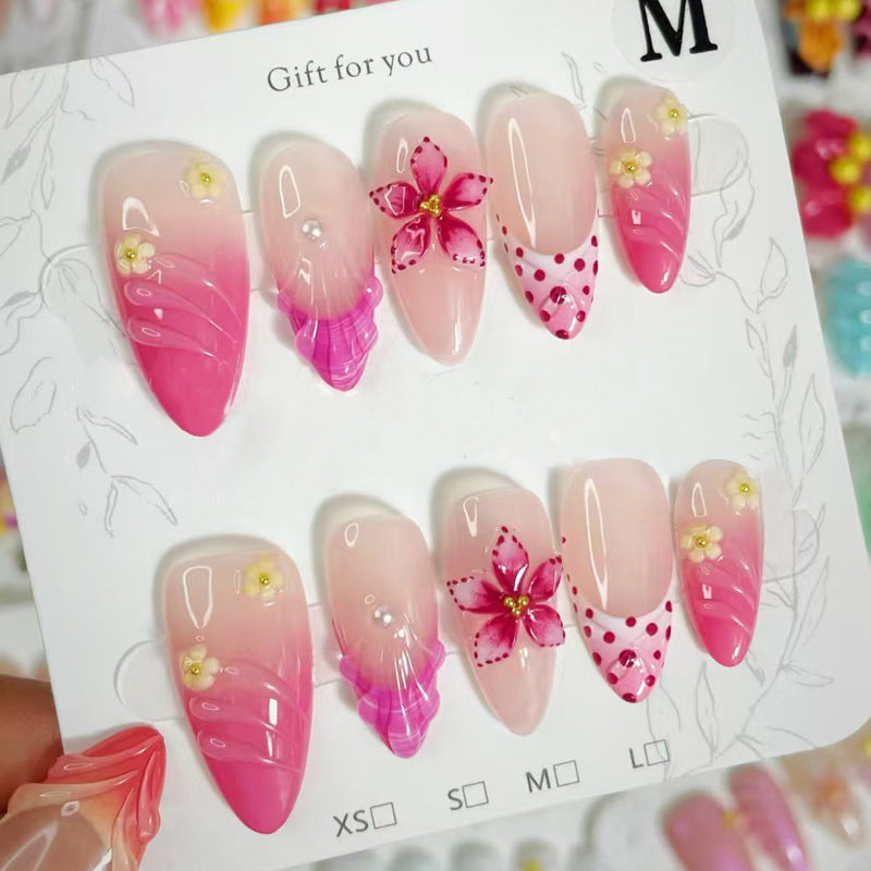 Artful nail tips with delicate floral embellishments Bowlift
