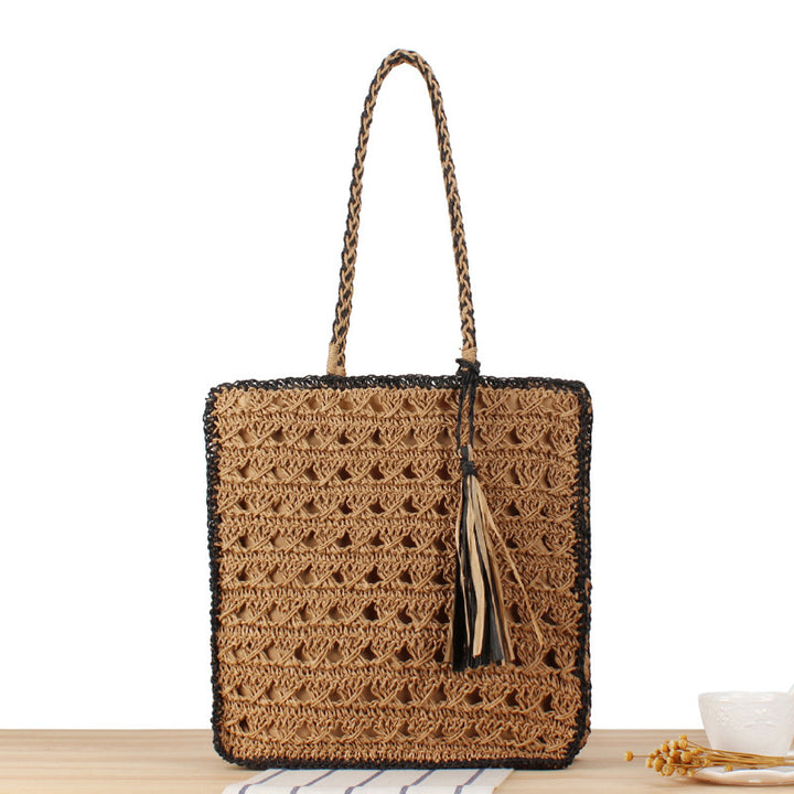 Handbag Made of Hand-Woven Natural Material with Appealing Tassel Detail Bowlift