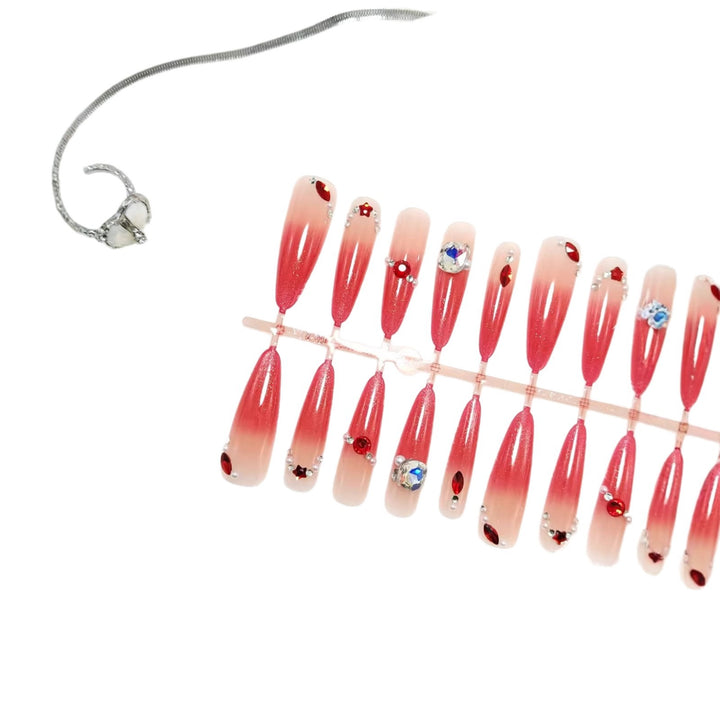 Glamorous artificial nails with sparkling ombre effect and elegant embellishments Bowlift