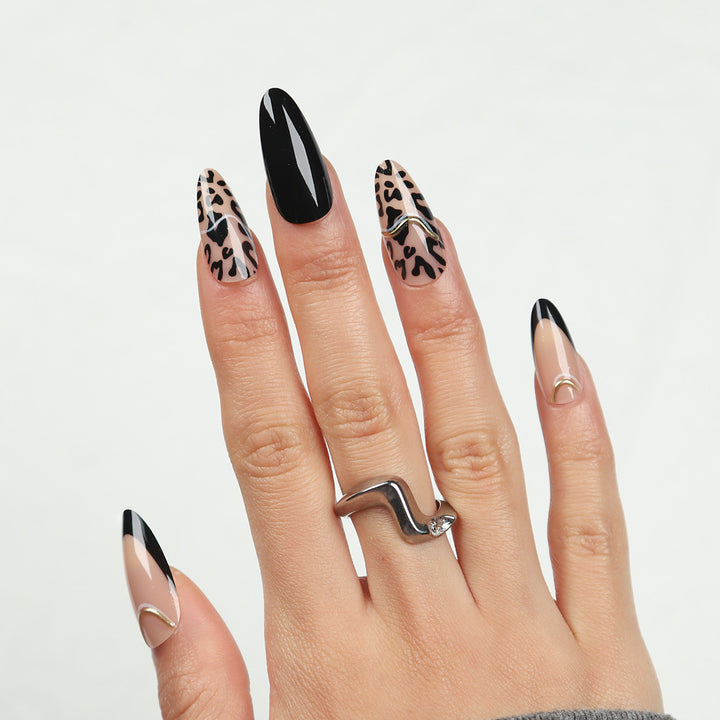 Artistic Stiletto Nail Extensions with Animal Print Design Bowlift