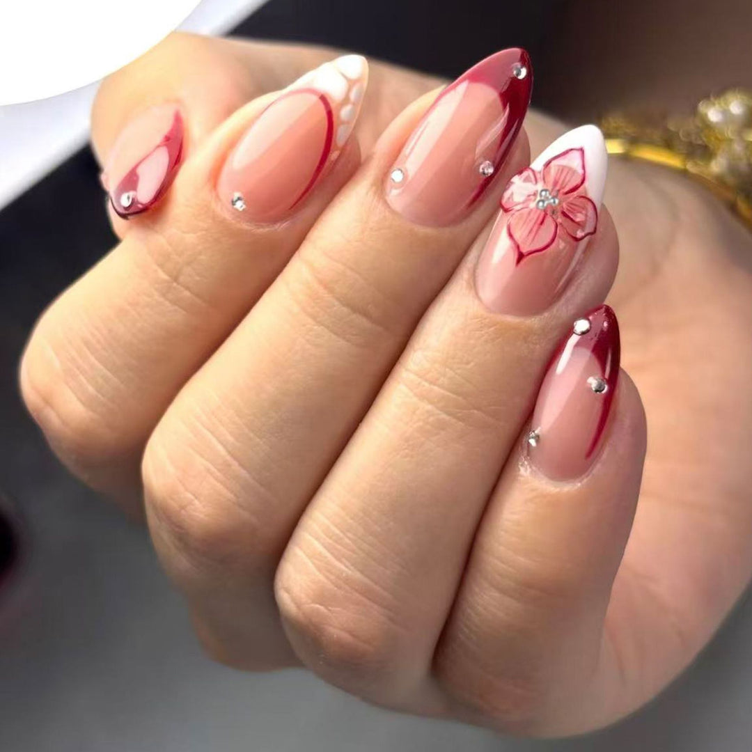 Artificial nails with floral and glittering accents Bowlift