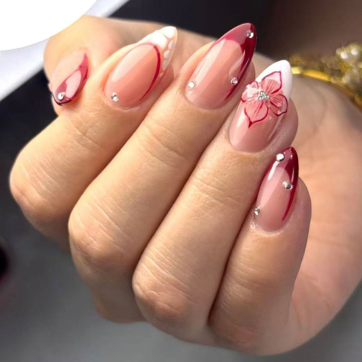 Artificial nails with floral and glittering accents Bowlift