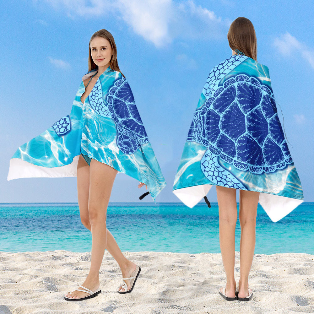 Hooded beach poncho with mandala motif Bowlift