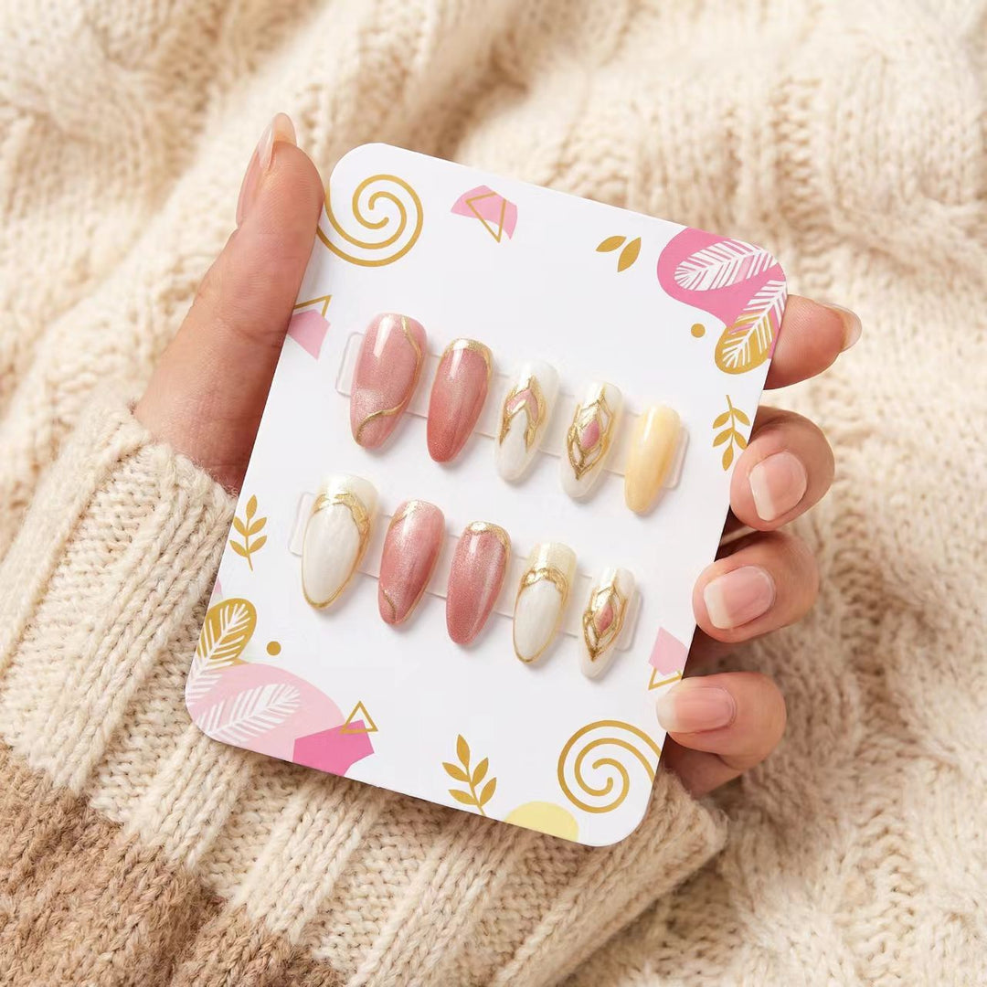 Artificial nails with floral gold accents and glossy finish Bowlift