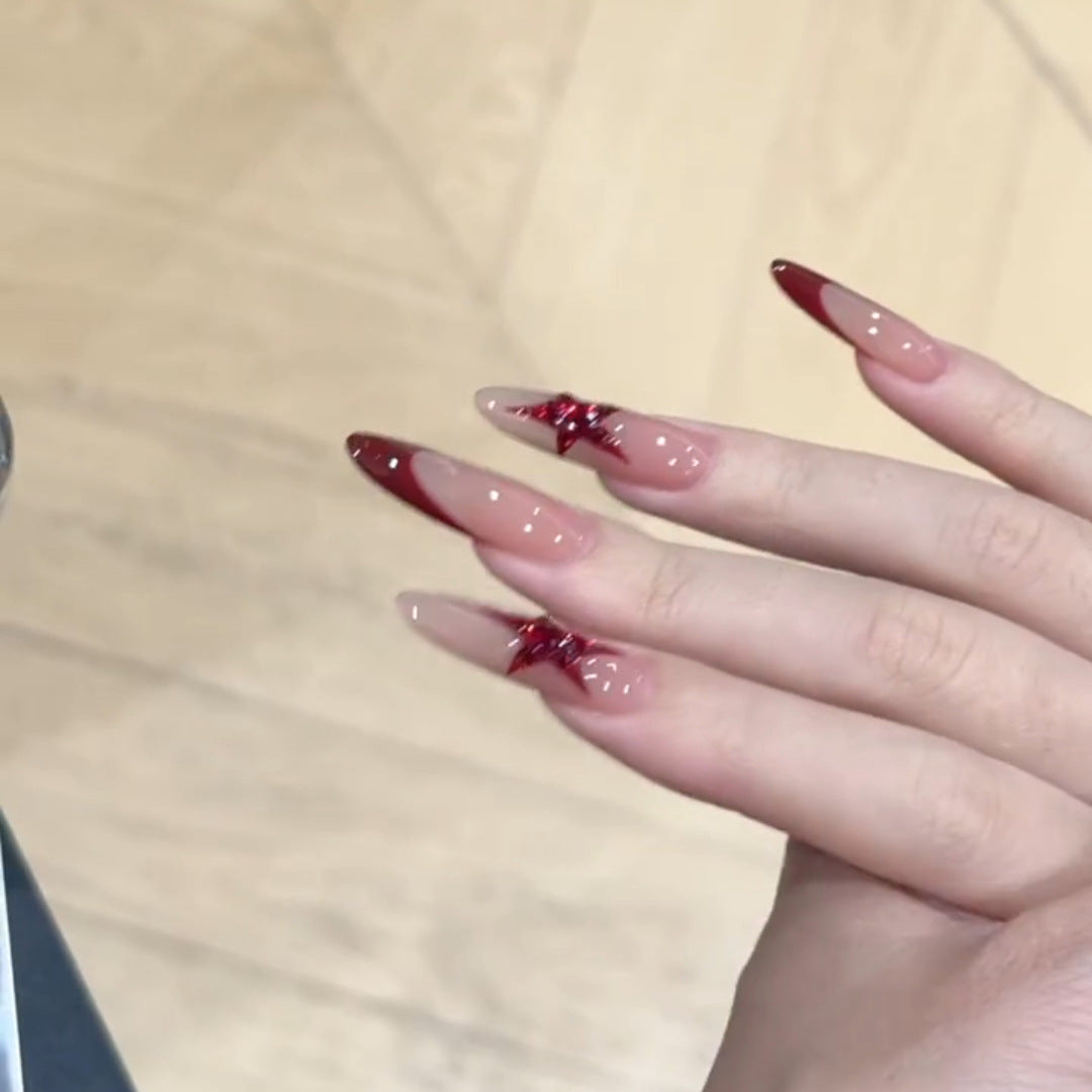 Fake nails with glitter star design Bowlift