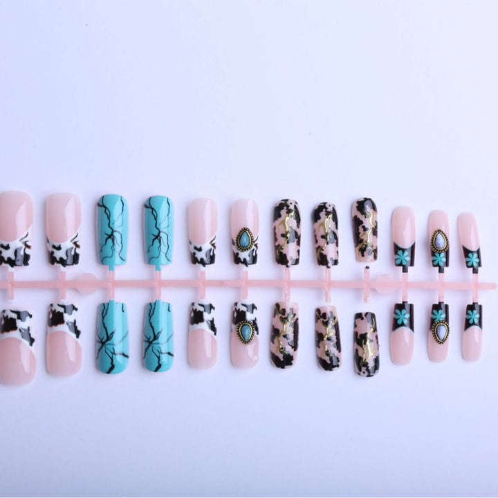 Artful fingernails with unique marble and jewelry design Bowlift