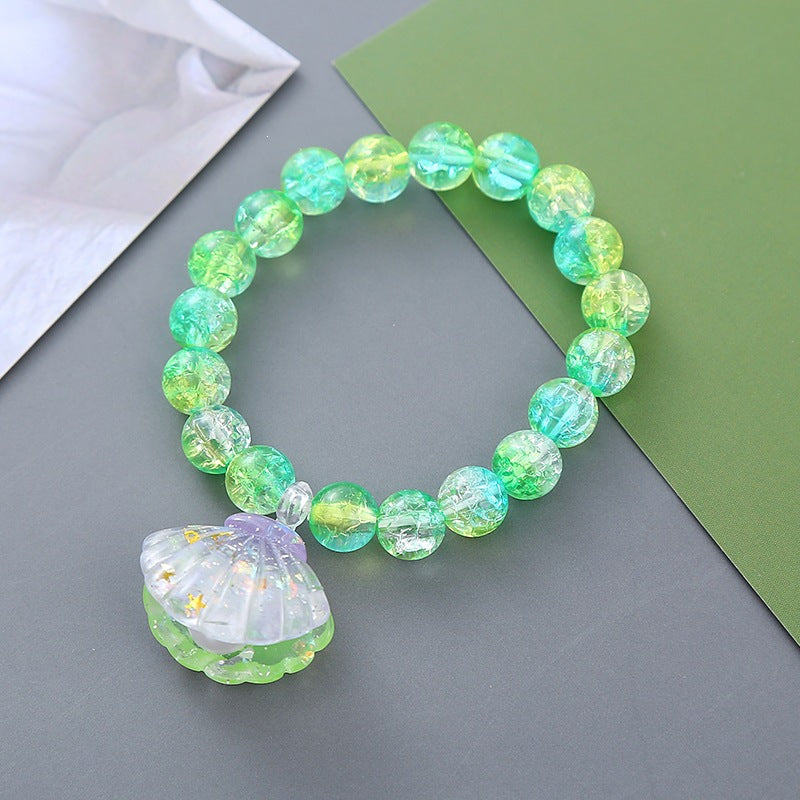 Playful bracelet with shell pendant Bowlift