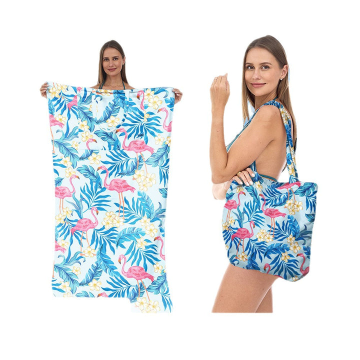 Beach towel with elegant floral patterns Bowlift