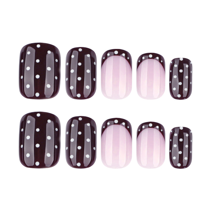 Artful nail art with elegant polka dot design Bowlift
