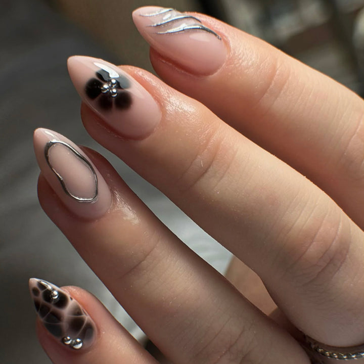 Creative Nail Art with Glitter Accents Bowlift