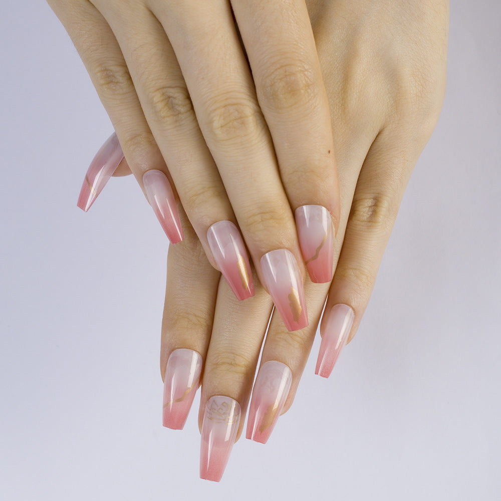 Artificial nails with elegant gradient color and golden accent decoration Bowlift