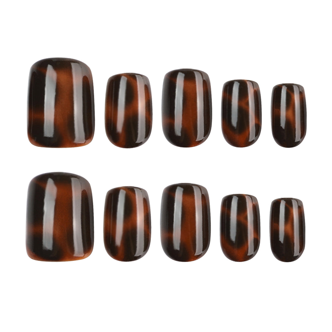 Artificial nail extensions with elegant tortoiseshell decor Bowlift