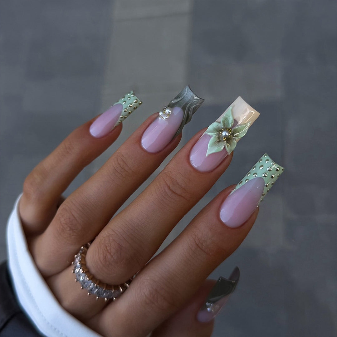 Creative acrylic nails with 3D floral design Bowlift