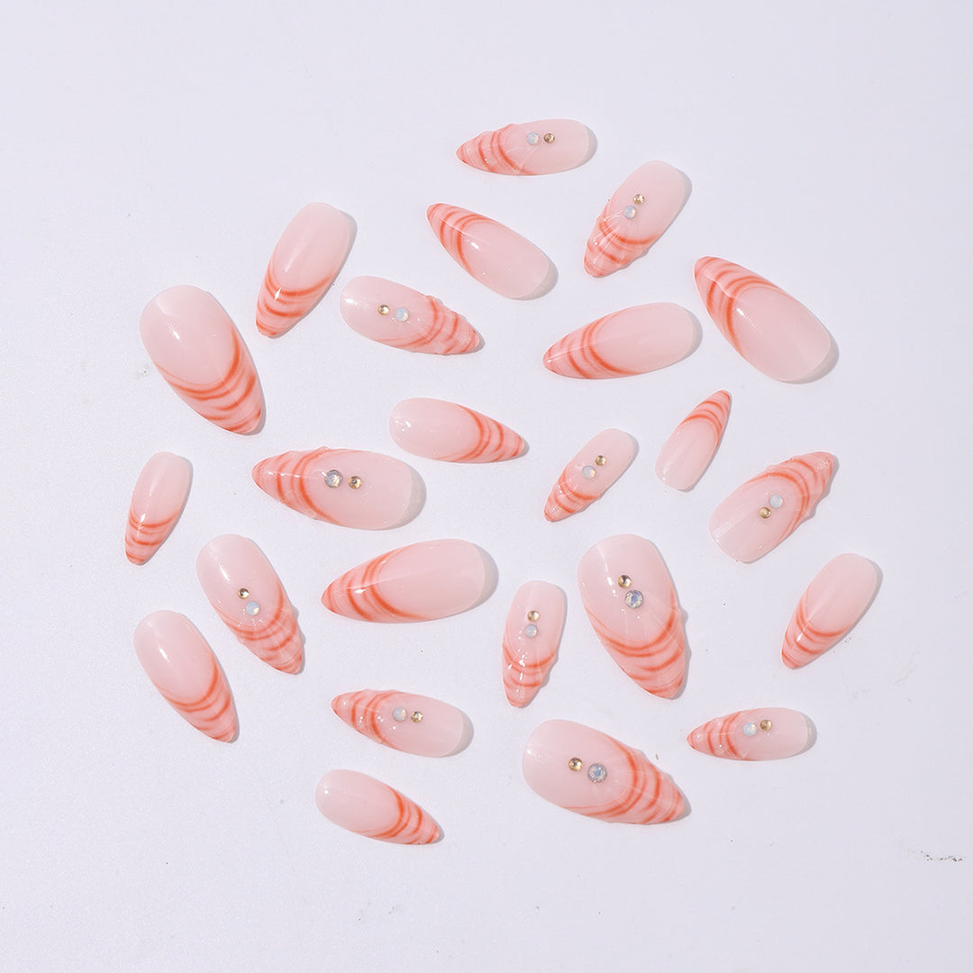 Acrylic nail set with curved tip style and glitter accents Bowlift