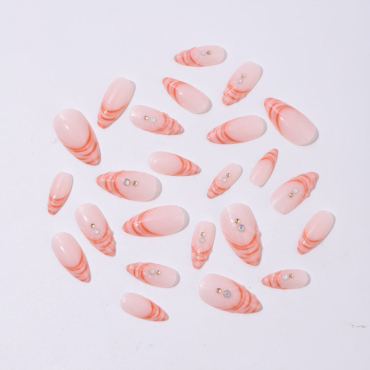 Acrylic nail set with curved tip style and glitter accents Bowlift
