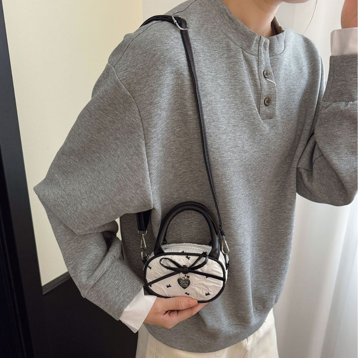 Quilted Mini Handbag with Heart Detail Bowlift