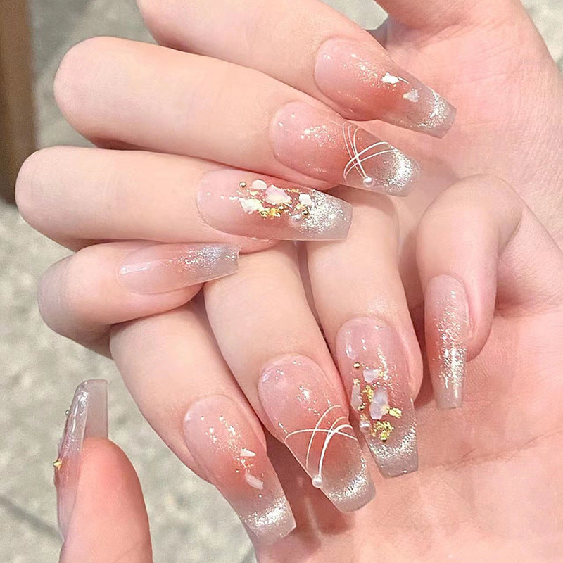 Artistic Press-On Nail Set with Glittery Star Accents Bowlift