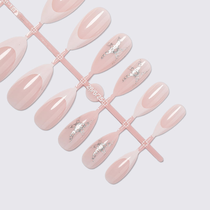 Artificial nail set with delicate pearlescent and glitter accents Bowlift