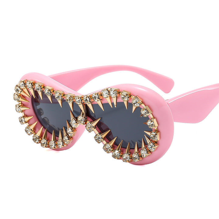 Women's fashionable sunglasses with extravagant spikes and crystal embellishments Bowlift