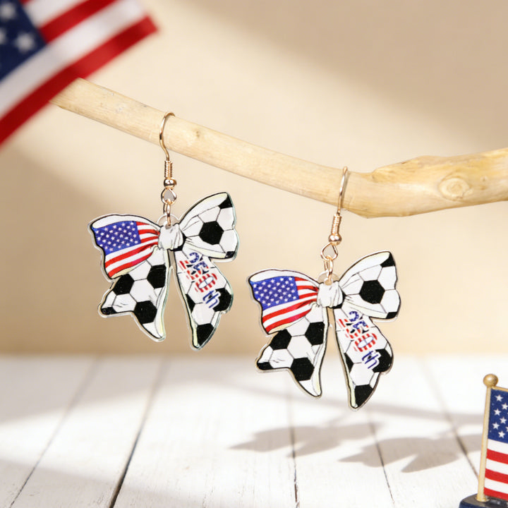 Women's eye-catching statement earrings made of acrylic with patriotic bow pendant Bowlift