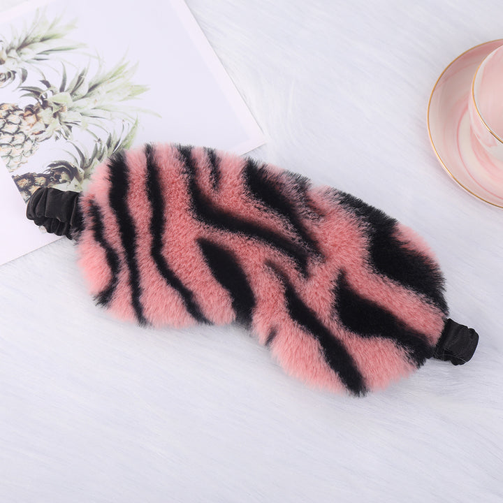 Women's cuddly faux fur sleep mask with heart-embossed surface and gathered comfort band Bowlift