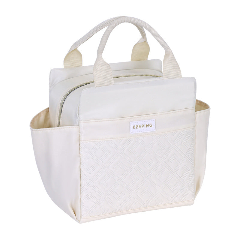 Cooler bag with insulating interior and practical compartment design Bowlift