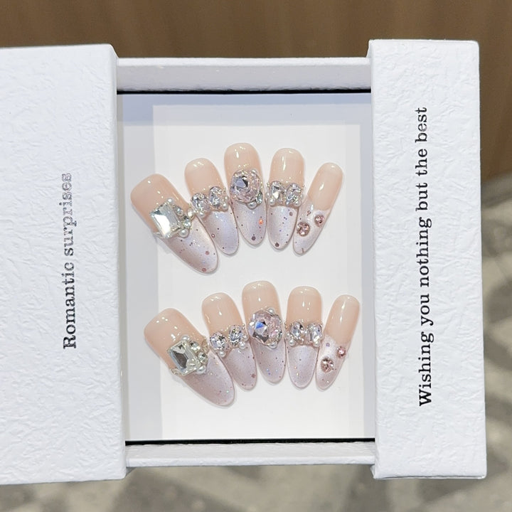 Romantic artificial nails with glitter decoration Bowlift