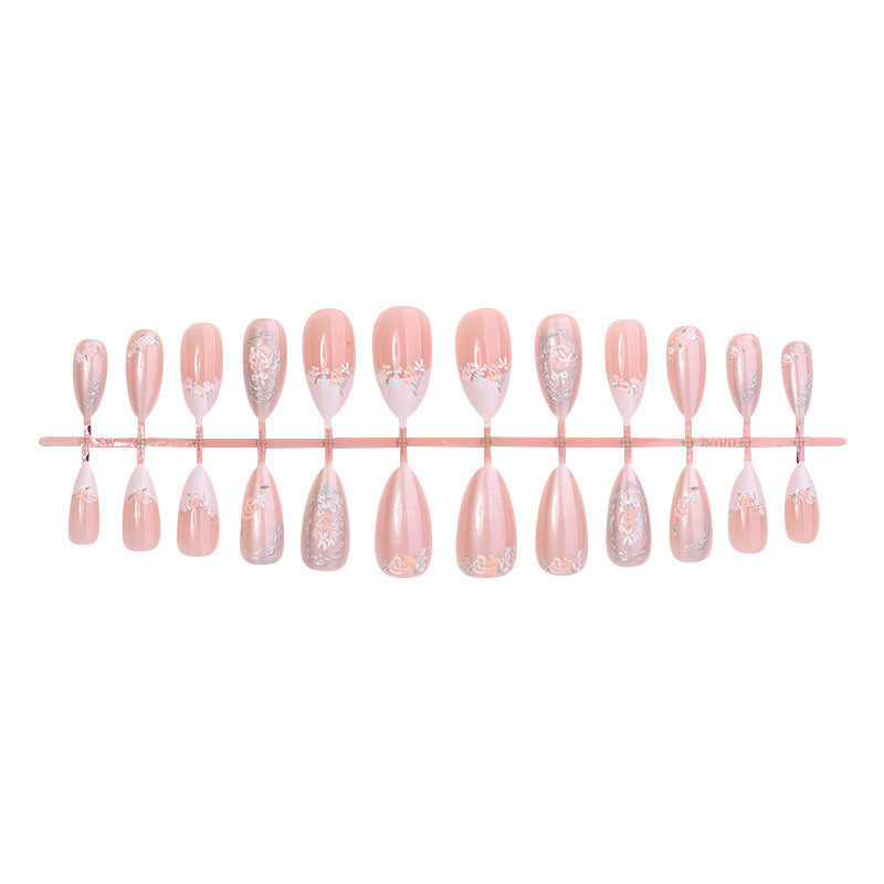 Acrylic nail set with elegant floral and glitter motifs Bowlift