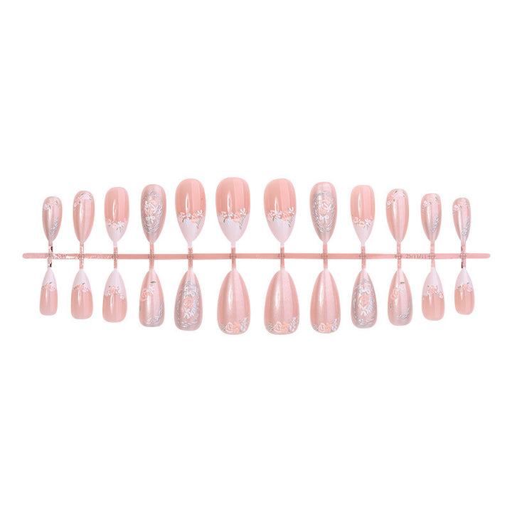 Acrylic nail set with elegant floral and glitter motifs Bowlift