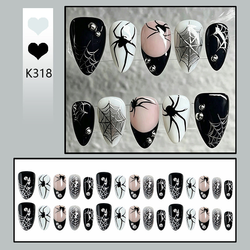 Creative nail art set with Halloween spider design Bowlift