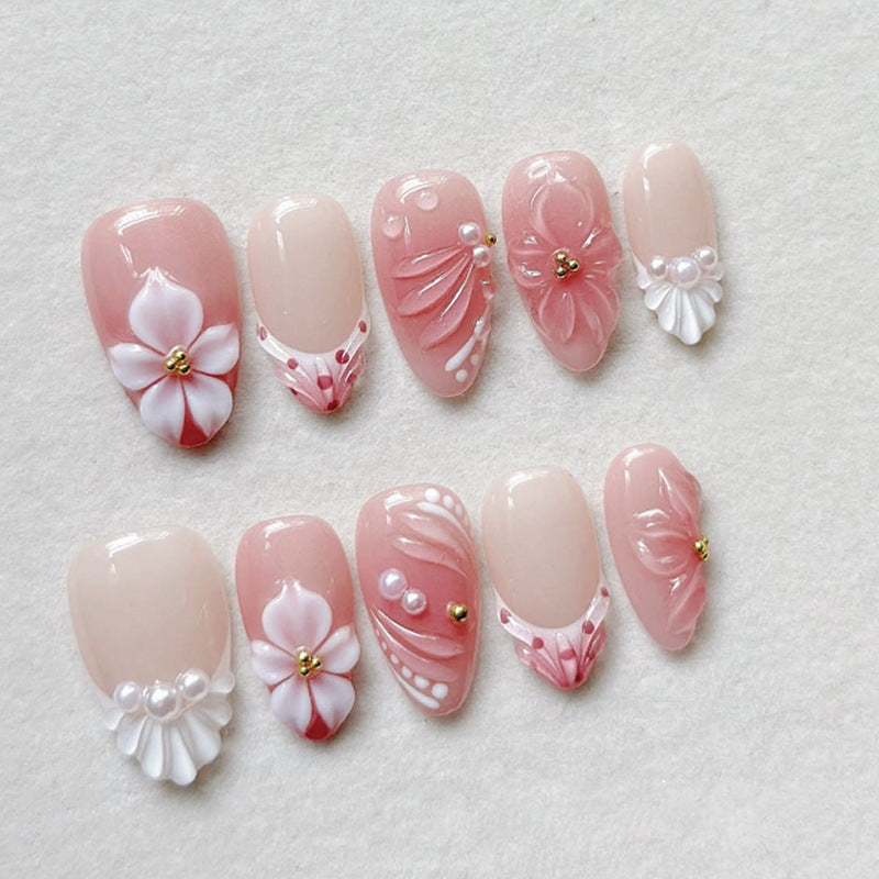 Artificial nail set with elegant floral accents Bowlift
