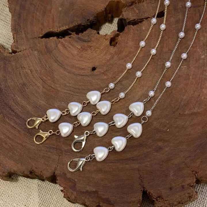 Stylish jewelry band with heart-shaped beads Bowlift