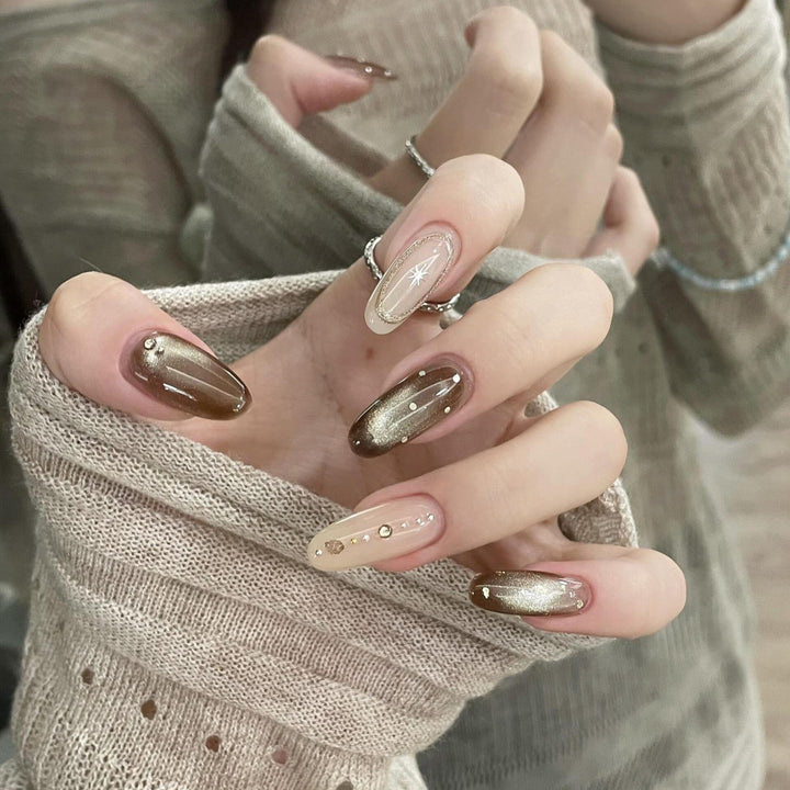 Artificial nails with glitter and star design Bowlift