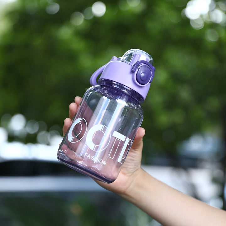 Women's transparent sports water bottle with practical Bowlift attachment