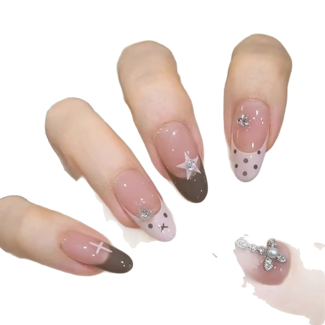 Artistic Press-On Nail Design with Decorative Accents Bowlift