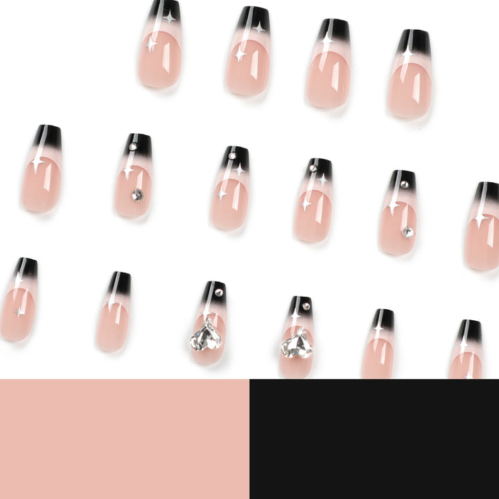 Artificial nail extensions with elegant ombre design and glitter accents Bowlift