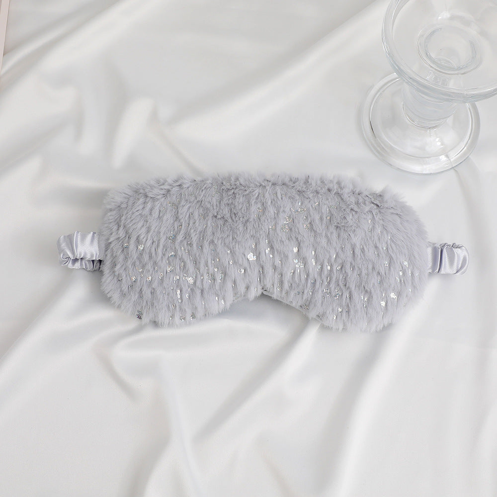 Unisex soft eye mask made of faux fur with festive motif embossing Bowlift