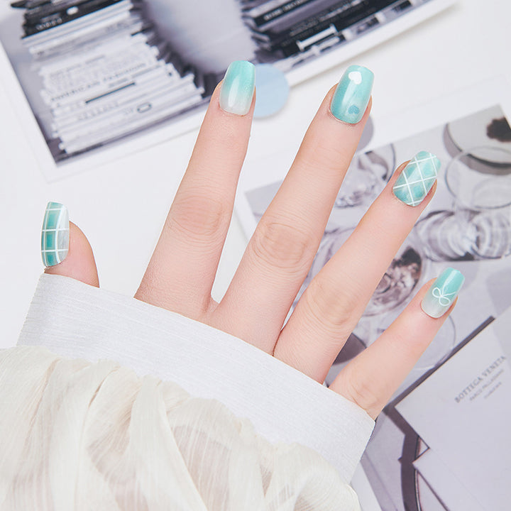 Artistic nail extensions with floral accents Bowlift