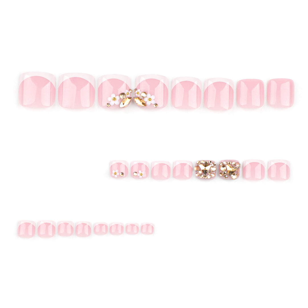Artistic toenail art with elegant flower and glitter accents Bowlift